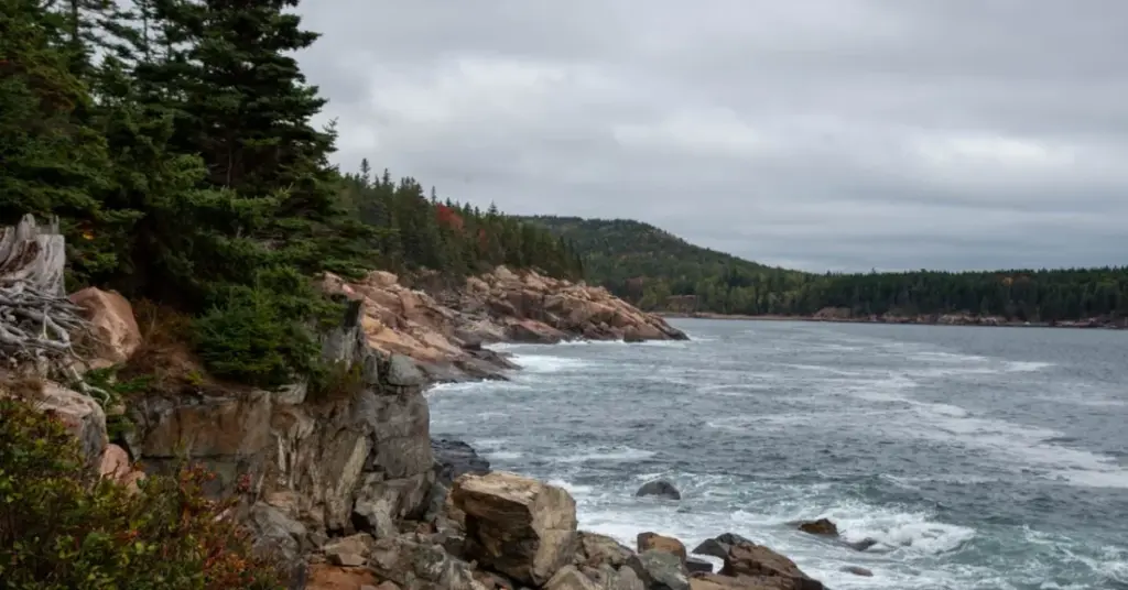 rocky coastline and sunrise light at Acadia National Park in Maine.Most Beautiful Places In America