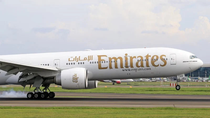 Emirates airplane on the runway at Dubai International AirportEmirates airplane on the runway at Dubai International Airport