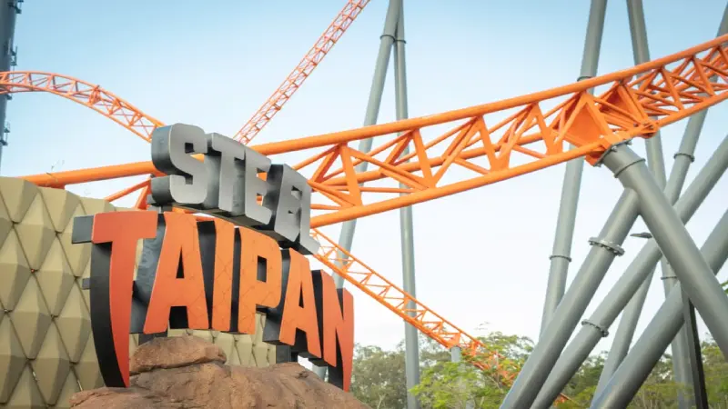 Family riding a rollercoaster together at a Gold Coast theme park