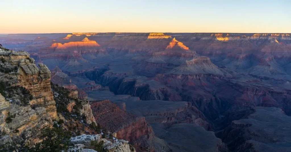 Beautiful Places in America The Grand Canyon glowing orange and red at sunset from the South Rim