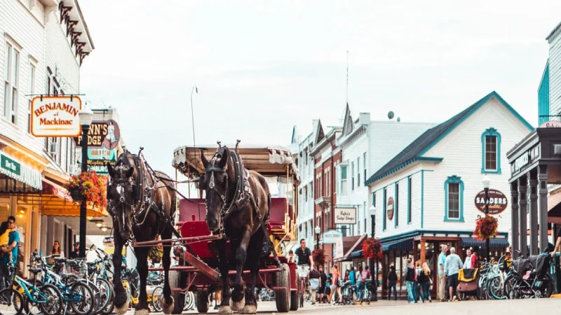 Bicycles and a horse-drawn carriage on car-free Mackinac Island
