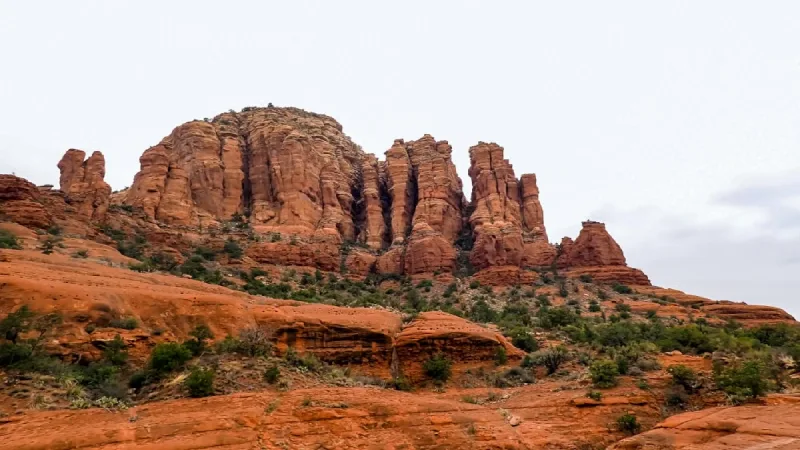 Family looking at red rock formations during a road trip stop in Sedona