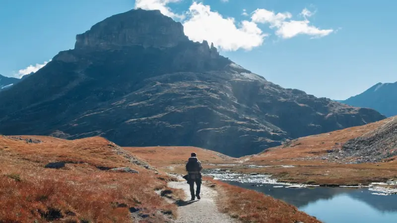 Hiker on a mountain trail in Banff National Park Canada