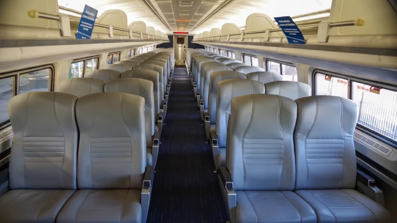 A reclining coach class seat on an Amtrak train