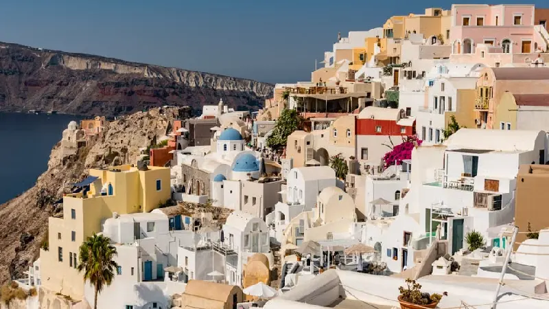 Cliffside villages overlooking the volcanic caldera in Santorini