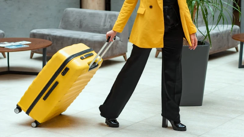 Carry-on suitcase and travel backpack ready for an airport trip