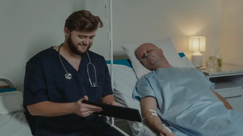 Doctor reviewing a medical chart with a senior patient