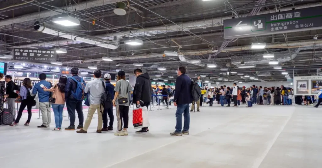 Japan Visa Free Countries List. Traveler at passport control immigration at a Japanese airport