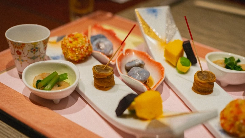 A multi-course kaiseki dinner served at a traditional Japanese ryokan